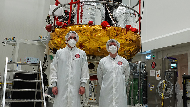 Matt Jones and Andy Cheney in front of the SMILE spacecraft at ESTEC.