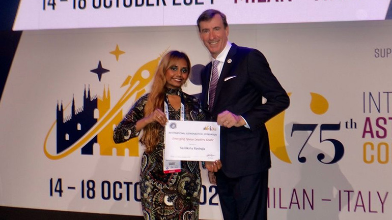 Sam Ravi receiving her Emerging Space Leader award at the International Astronautical Congress in Milan.
