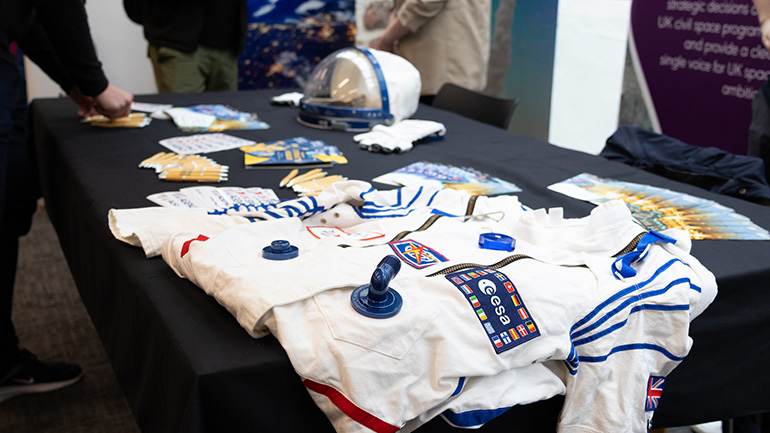 A space suit at NSSC 2024.