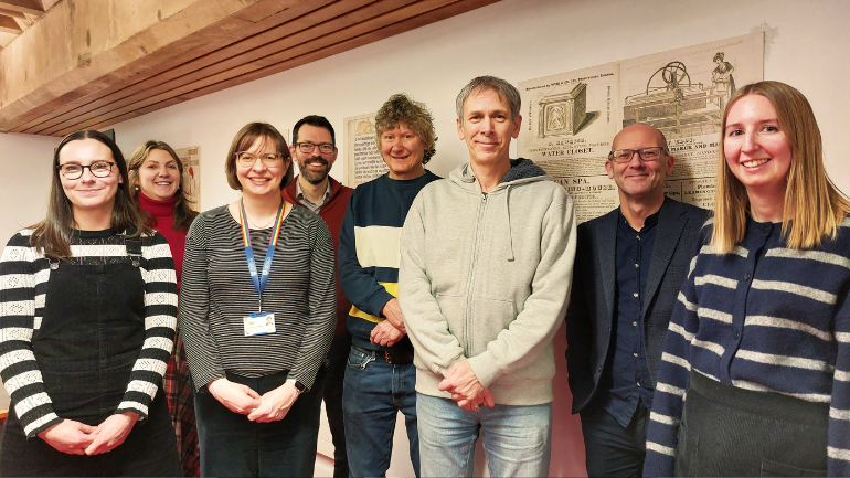 the archive team posing for a group photo