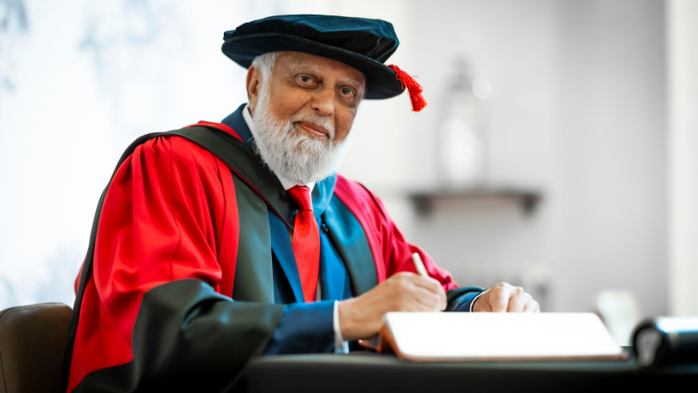 Suleman Nagdi in his graduation robes 