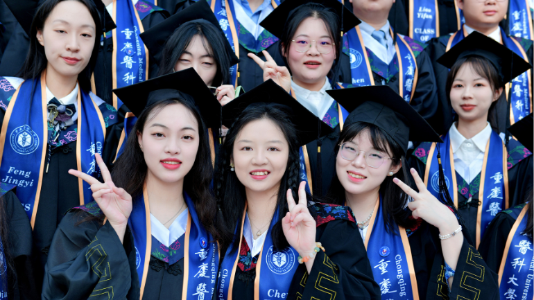 some of our graduating students in china posing for the camera