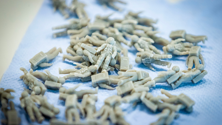 3D printed astronaut figures.