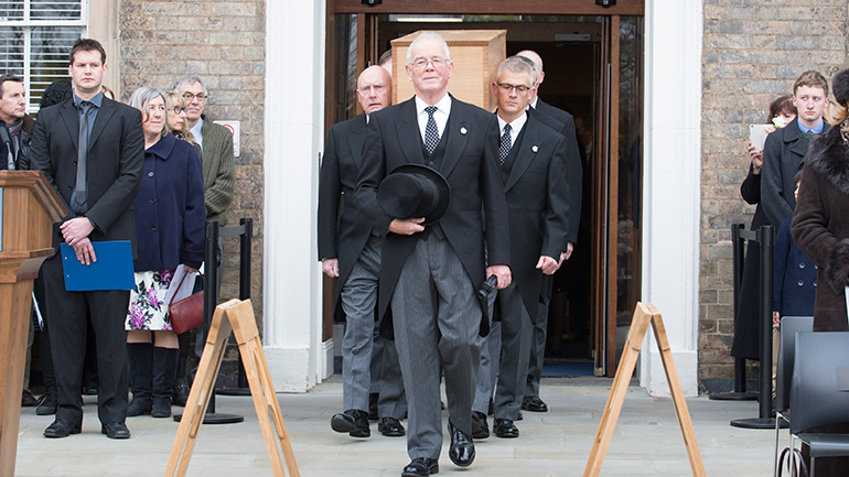 Richard III's coffin leaves the Fielding Johnson Building.