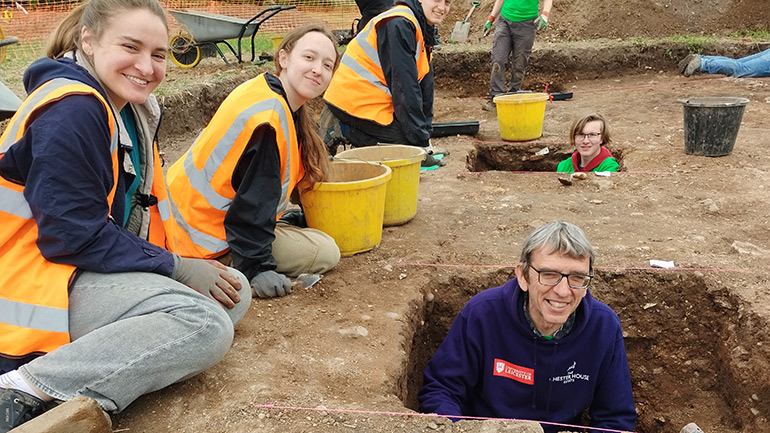 Dr Jeremy Taylor and students from the University of Leicester excavate the foundations of the villa complex.