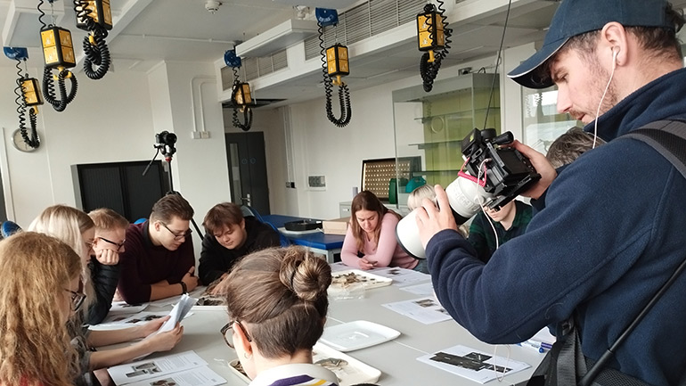 Time Team film a post-excavation workshop where students from the University of Leicester identified and recorded finds and pottery which they found during the excavations of the villa complex.