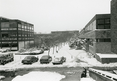 Campus buildings in snow, 1980s.
