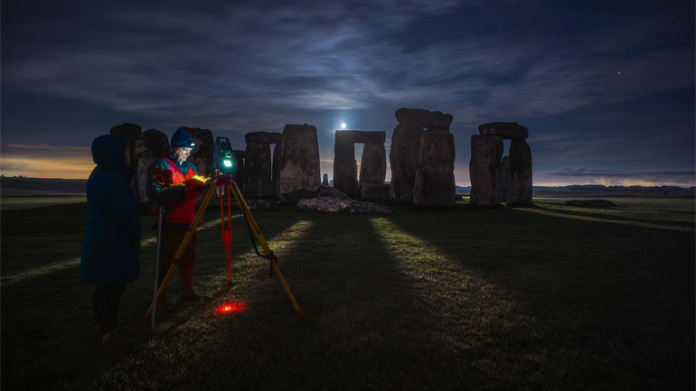 Professor Clive Ruggles surveying Stonehenge