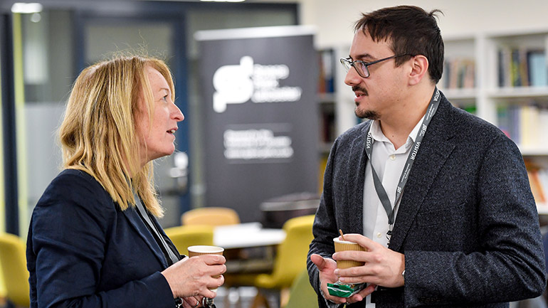 Visitors in conversation at Space Park Leicester.