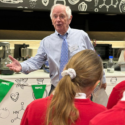Johnny Ball gives a demonstration to local schoolchildren.
