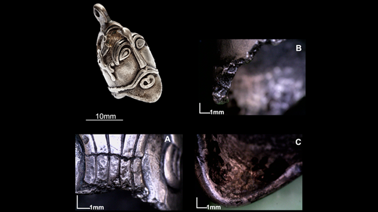 ‘Decapitated’ head of silver pendant, showing the traces of percussion used to detach the head from the rest of the object. Image credit: The Body-Politics project 