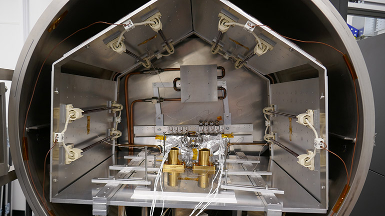 Am-RHUs in thermal vacuum chamber for thermal cycling qualification testing.
