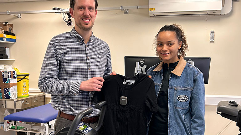 Associate Professor Tom Ward and student Megan Harper with the T-shirt