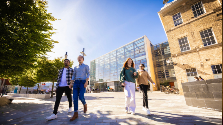 students walking across campus