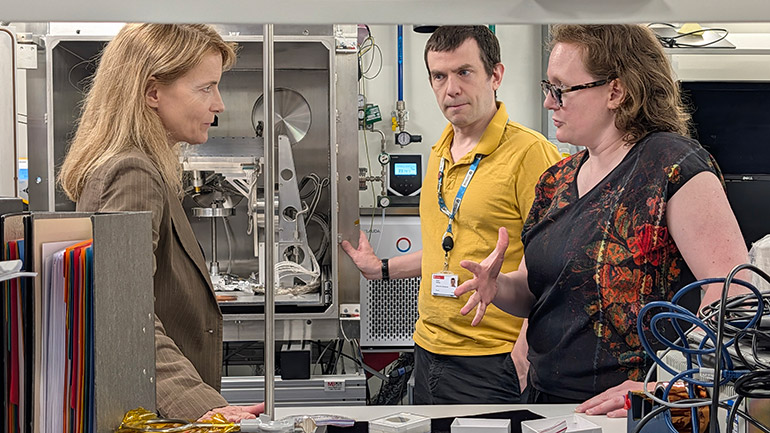 Staff at Space Park Leicester explain their work to Baroness Lloyd.
