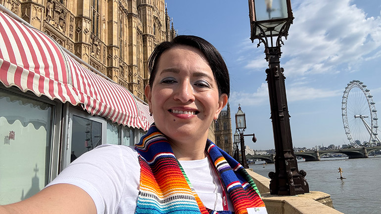 Dr Manuela Trejo receiving her award at the House of Lords.