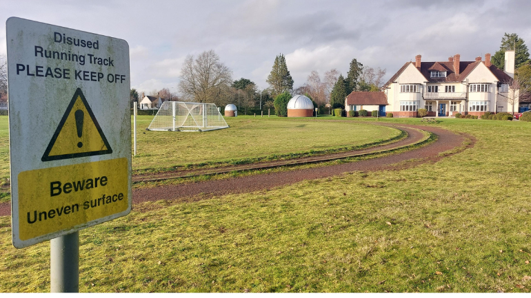 image of a warning sign at the running track