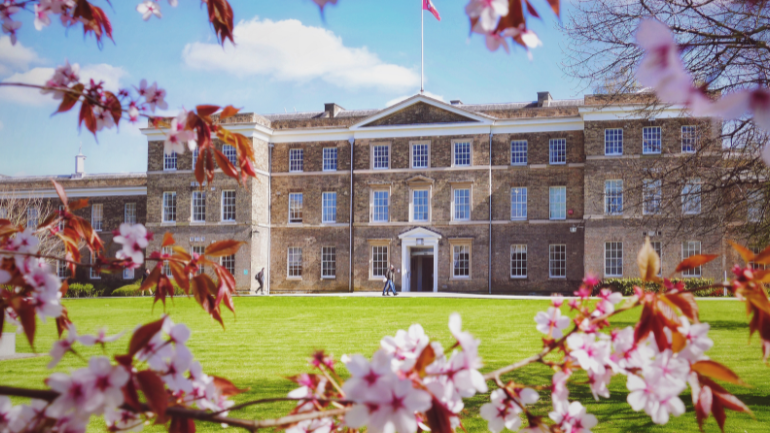exterior of fielding johnson building in spring time