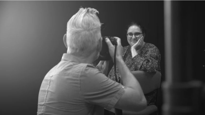 Photographer takes a picture of Dr Diane Levine.