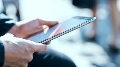 journalist using tablet computer