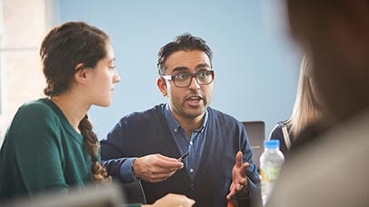 a consultation taking place in a classroom