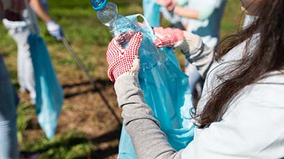 students volunteering around campus