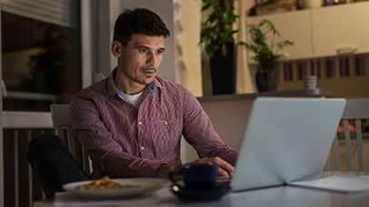 Student working at a laptop