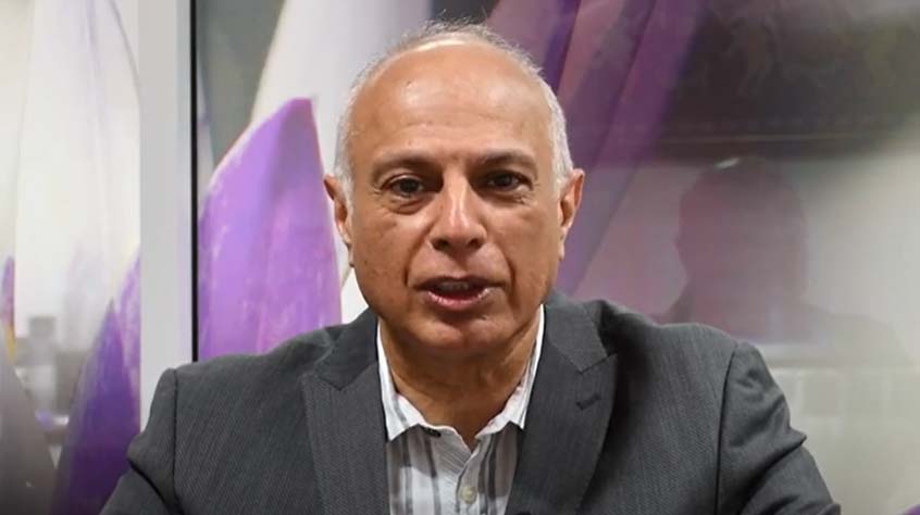 Kamlesh Khunti talking to camera.