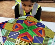 Child looking at mirror pattern