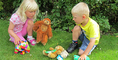 Two children playing with Elmer