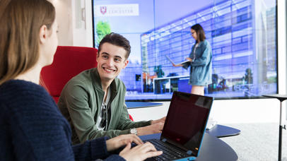 students on laptop studying