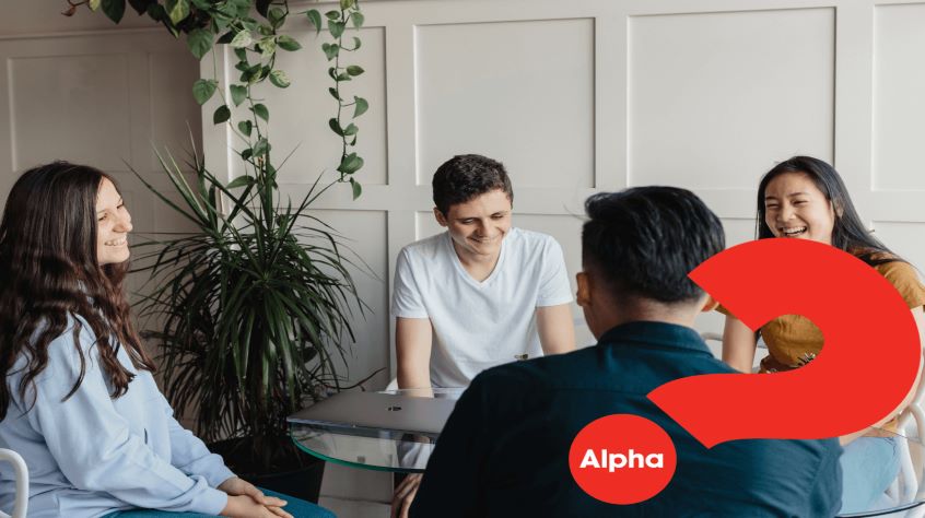 People chatting around a table