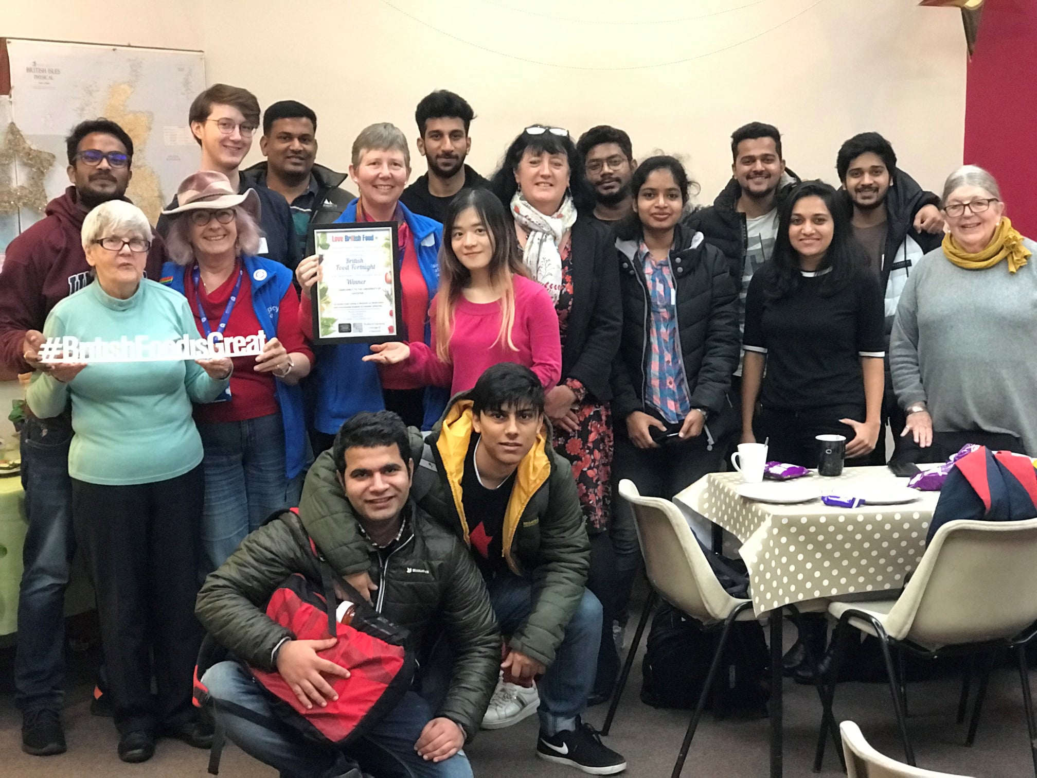 A group of students and chaplains receiving an award