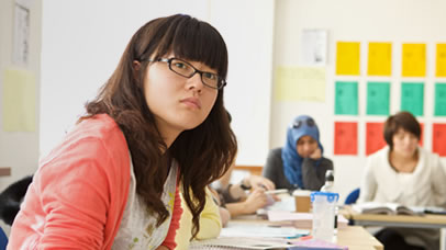 English students studying in a classroom