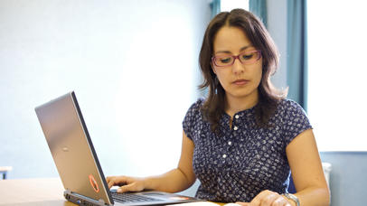Lady studying a textbook