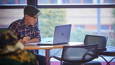 Student working on a laptop