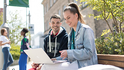 Students laughing on campus