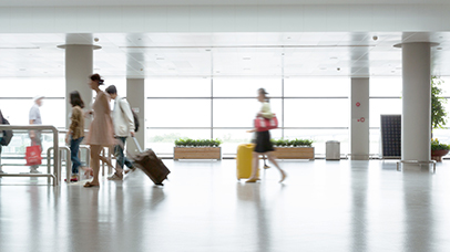 People walking through an airport