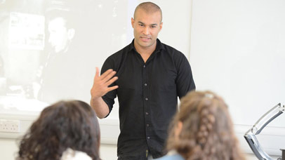 An academic teaching students in the classroom