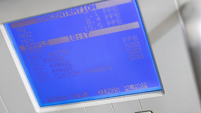 Screen on pollution-detecting equipment displaying concentration levels