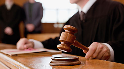 Judge in a courtroom.