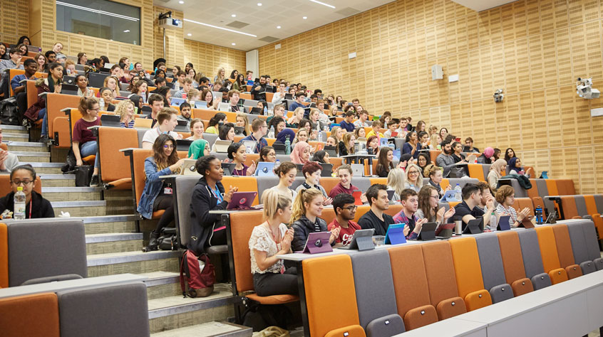 Students sitting in a lecture theatre