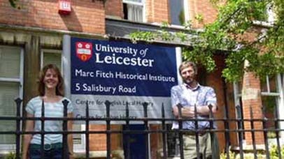 staff members outside marc fitch house