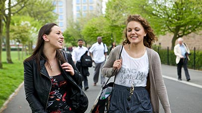 students walking together in the park