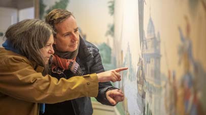 Professor Suzanne MacLeod and Professor Richard Sandell looking at a painting