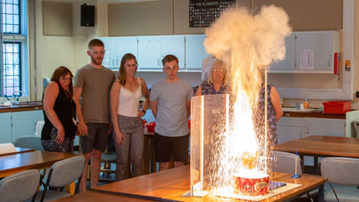 People in a lab overseeing an experiment