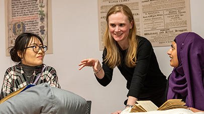 A group of three women collaborating 