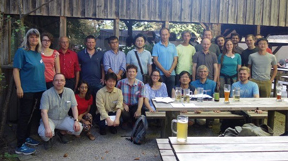 A collection of people posing for a photograph