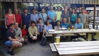 A collection of people posing for a photograph