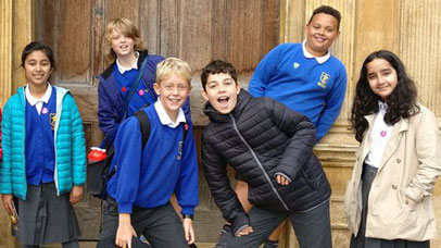 Children from the project in front of a country house.